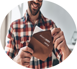 man with only half face showing, with a smile on his face, wearing glasses in a checkered shirt, opening an envelope with From HBB GROUP on the back for customer service care and personal message